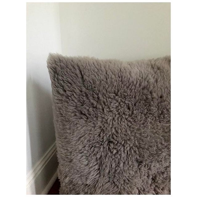 This versatile sheepskin textile brings warmth and richness to any space. Perfect for layering with other furnishing,...