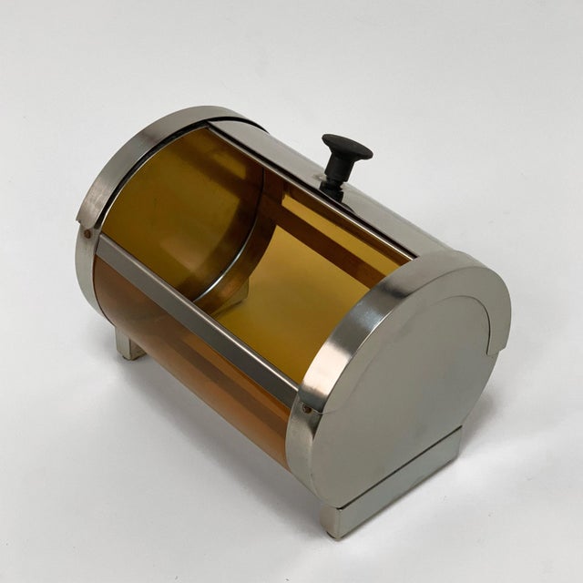 - Table or bench container in steel and plastic - Sliding opening, suction cup feet - Made in Italy, 1970s