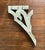 A gorgeous, antique wood corbel fragment. Features a scrolled, swan head bracket detail with a distressed finish in...