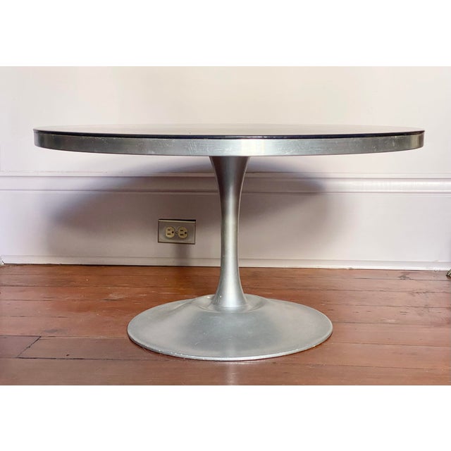 Rotating Danish Tulip Coffee Table designed by Poul Cadovius, for France & Son, from Denmark. The top is by Bjørn Wiinblad...