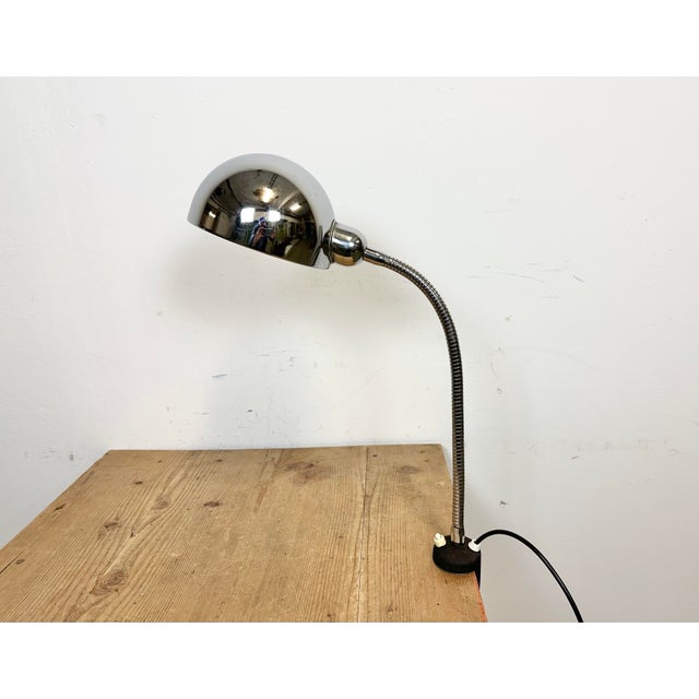 Industrial chrome flexible gooseneck table lamp with clamp base made in Italy during the 1960s. Good vintage condition....