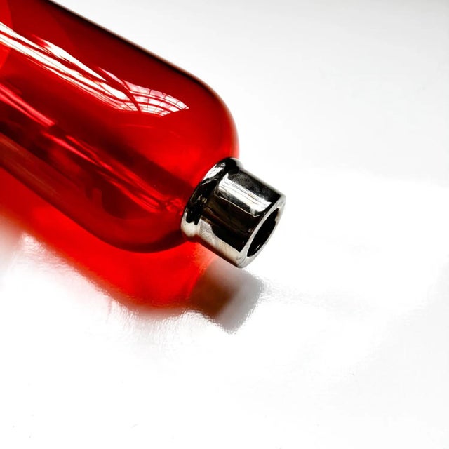 Details: • Origin: Baccarat, France • Era: Mid-20th century • Material: Baccarat amber crystal, silver-plated metal collar...