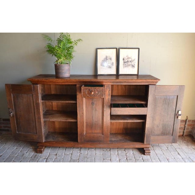 18th-century German oak milk cabinet, sideboard, or chest of drawers. Height: 103 cm. Width: 165 cm. Depth: 46 cm. One...