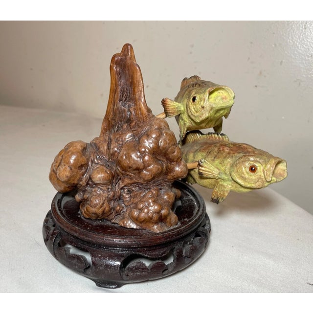Up for sale is a wonderful vintage hand carved wooden bass sculpture. It has a lovely natural burl wooden base with two...