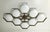 Italian midcentury flush mount with eight matte white Murano glass shades mounted on solid brass frame in bronze finish /...