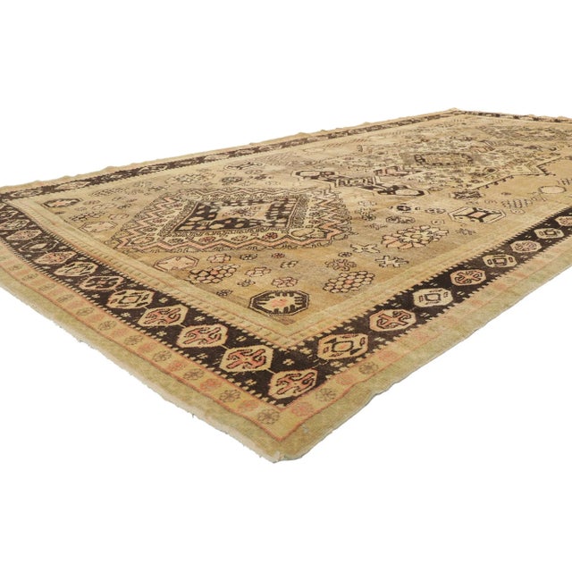 73806 Antique Turkestan Khotan Rug, 06'09 x 13'02. Warm and inviting with nomadic vibes, this hand-knotted wool antique...