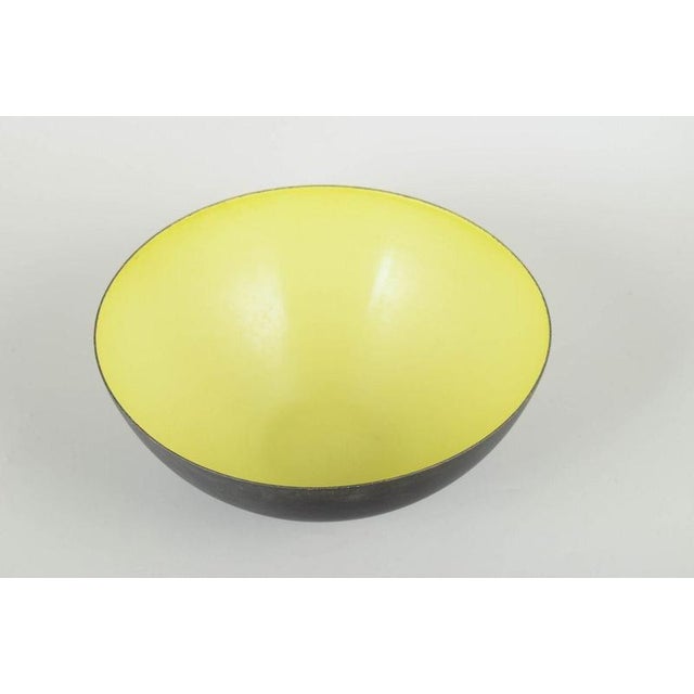 Krenit Bowl 1960s. Classic Danish design bowl in black-lacquered metal with an enamelled interior in a rare yellow colour....