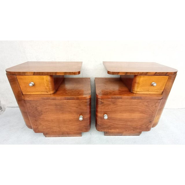Very nice and stylish bedside tables in Art Deco style, in original authentic condition. Made of walnut and spruce wood....