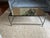 Sleek Oly Studio modern iron and mirrored coffee table by Oly, goes with any type of decor. Minimalist and understated...