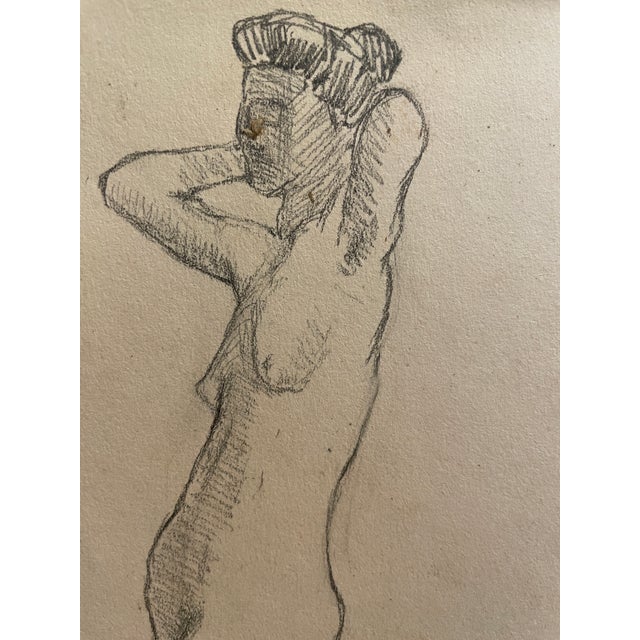 1907 drawing of a standing female nude from a group of drawings out of a 1907 sketchbook. The scenes are of Japan, some...