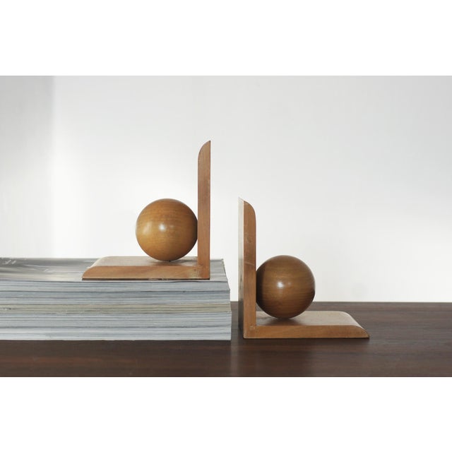 These vintage bookends from the 1960s stand out with their clear, modernist composition based on contrasting shapes. A...