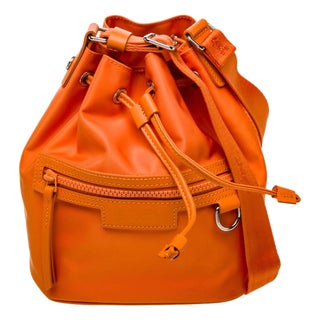 Longchamp Le Pliage Neoprene Crossbody Bucket Bag in Citrus Hermes Orange For Sale
