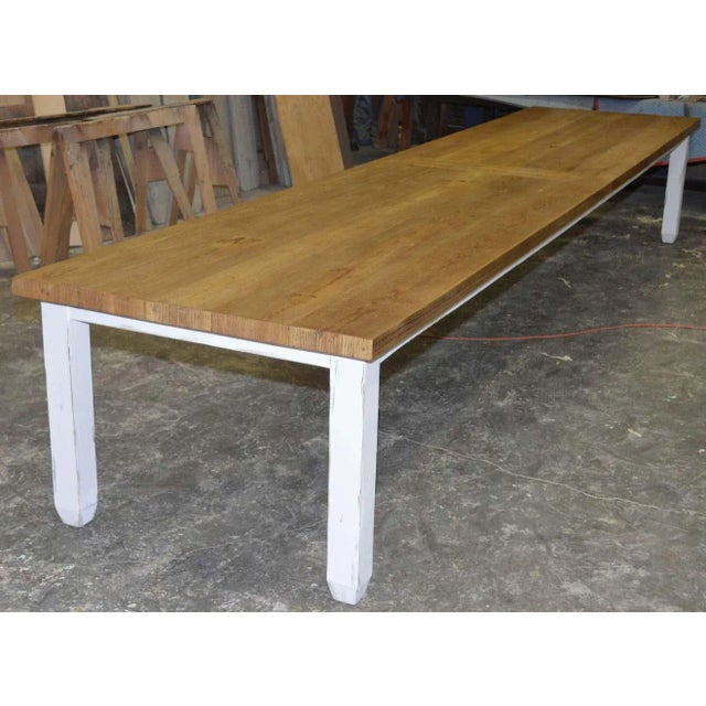 This long farm table is made entirely of reclaimed, vintage heart pine and hand selected for its beautiful patina and...