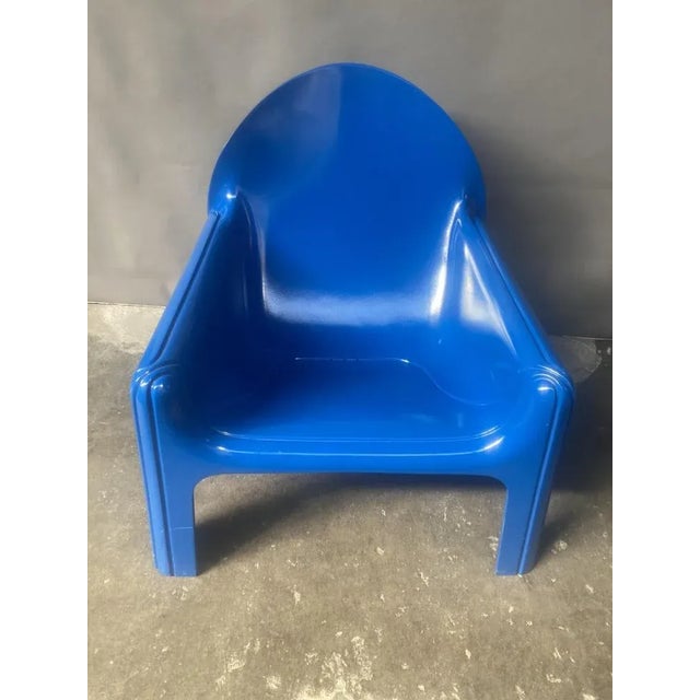 Iconic model 4794 lounge chair designed by Gae Aulenti, in blue, and manufactured by Kartell/Italy, in 1974. The chairs...