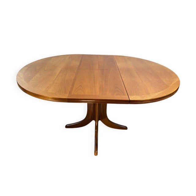 Vintage Extending Round Dining Table in Teak by Parker Knoll, 1970, in Restored conditions. Designed 1960 to 1969 This...