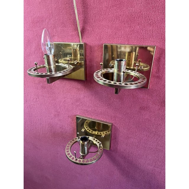 Set of 3 Sciolari wall lamps in brass and Murano glass Mid-Century 1960s Intact and in good condition, small signs of...