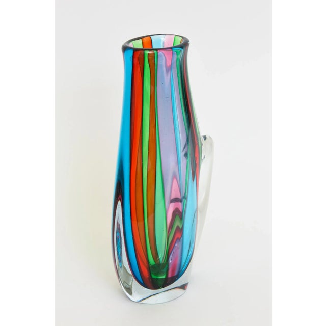 This vintage gorgeous jewel toned luscious signed Italian Murano glass pitcher or object has stripes of turquoise, green,...