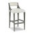 An upholstered back is situated above an upholstered seat with welt trim that is elevated over four squared tapering...
