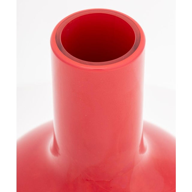 Venini Murano Red Art Glass Bottle Vase, 1982, with "vetri / murano" and "Venini / Made in Italy" labels and etched...