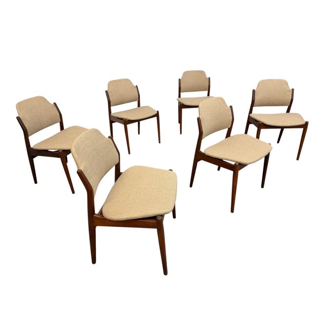 Exceptional set of six Mid-Century Danish Modern Model 62S dining chairs designed by Arne Vodder, circa 1960s. Crafted in...