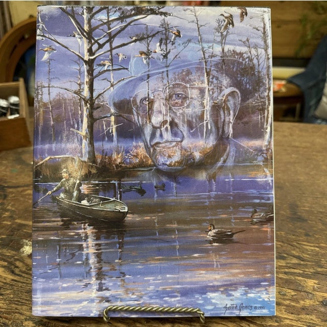 A signed hardcover book titled "Nash Buckingham Beaver Dam and Other Hunting Tales" by Dr. William "Chubby" Andrews....