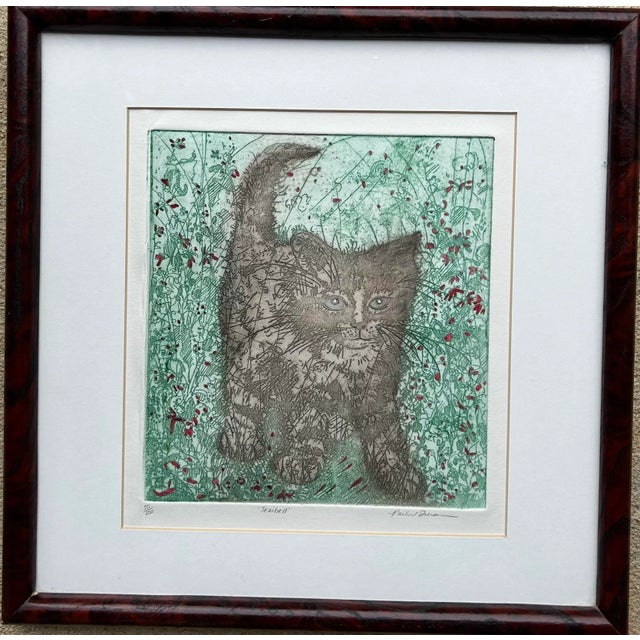 Original contemporary hand colored etching of a kitten in tall grass with wild flowers. Illegible signature to the lower...