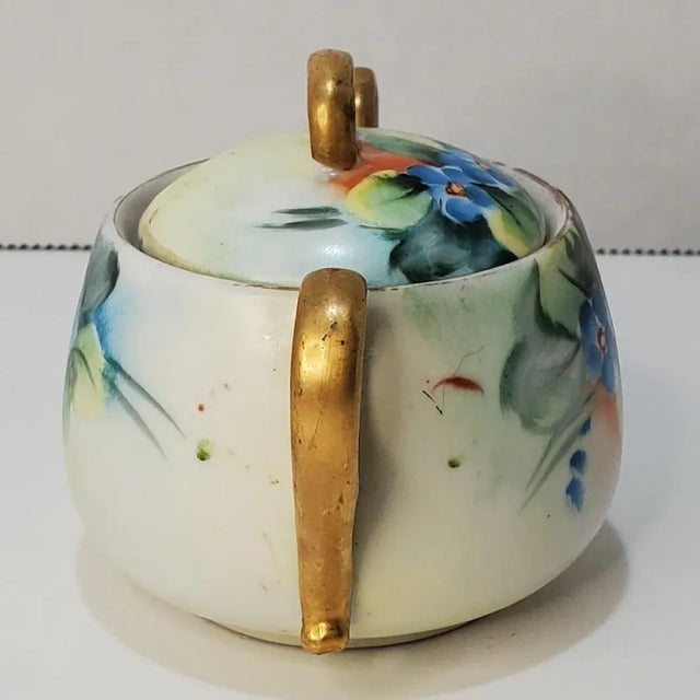This is such a sweet dainty condiment pot. The blue flowers are so beautiful, and I especially love the gold details. Fill...