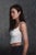 Jules by Kelly Birkenruth | Oil on Panel Portrait of a young woman in a white top. For Sale