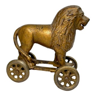 Antique Early 1920s Ac Williams Hand Painted Cast Iron Lion Still Bank on Wheels For Sale