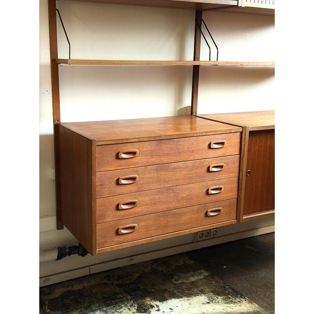 Preben sørensen ps system wall unit, teak, 1960s a beautifully designed modular wall-mounted shelving system by preben...