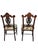 This product is a pair of 19th century rosewood Princess chairs with heavily carved detail. These antique armless chairs...