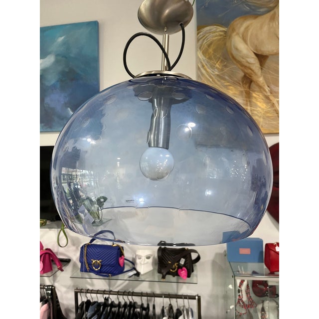 This is an incredible suspension light made with blown glass from the Murano furnaces of Mazzega. This beautiful blue...