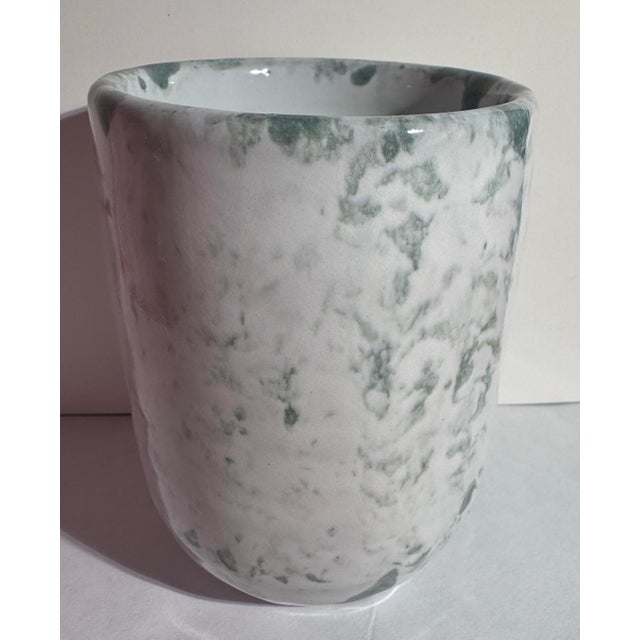 Add a beautiful touch of Southern studio craftsmanship to your table with this lovely, complementary pair of vintage Bybee...