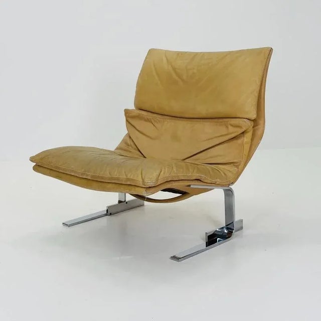 Bring timeless Italian sophistication into your home with this exceptional “Wave” lounge chair by Giovanni Offredi for...