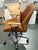 A sophisticated ACME Hamilton task chair combining industrial character with the warmth of natural materials. Upholstered...