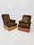 A wonderfully spirited pair of French Art Deco His-and-Hers armchairs dating to the 1930s, retaining their original...
