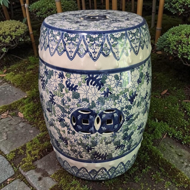 This Vintage Asian Ceramic Blue-White-Green Floral Garden Stool is a beautifully crafted piece with a round shape and...
