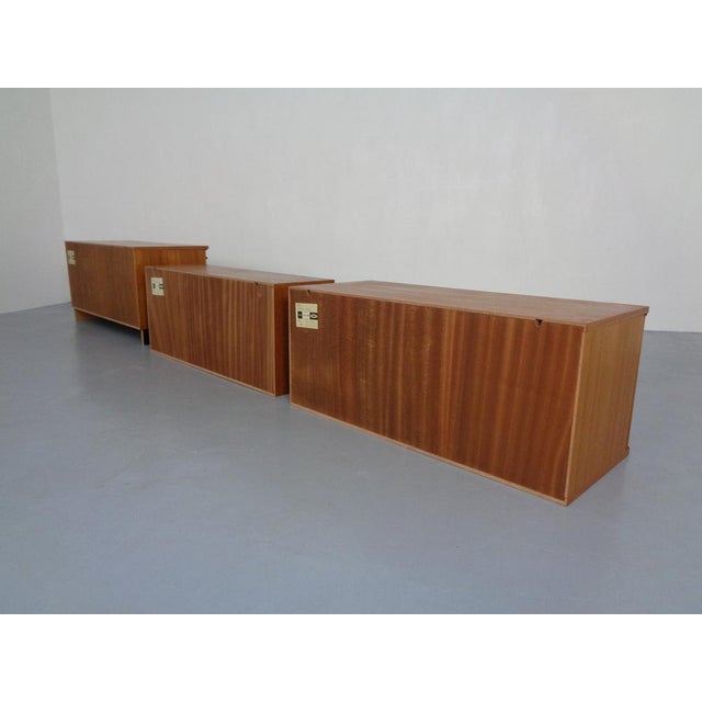 Rego Mobile Twen. Two small teak veneered sideboard and closet from the 1960s. Width 3 x 95 cm. Height 40/48 cm. Depth...