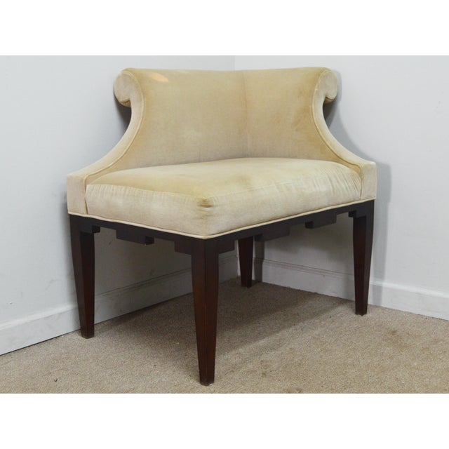 Castle Corner Chair by Baker. Store item #536. It featured wooden frame and upholstered top.