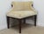 Castle Corner Chair by Baker. Store item #536. It featured wooden frame and upholstered top.