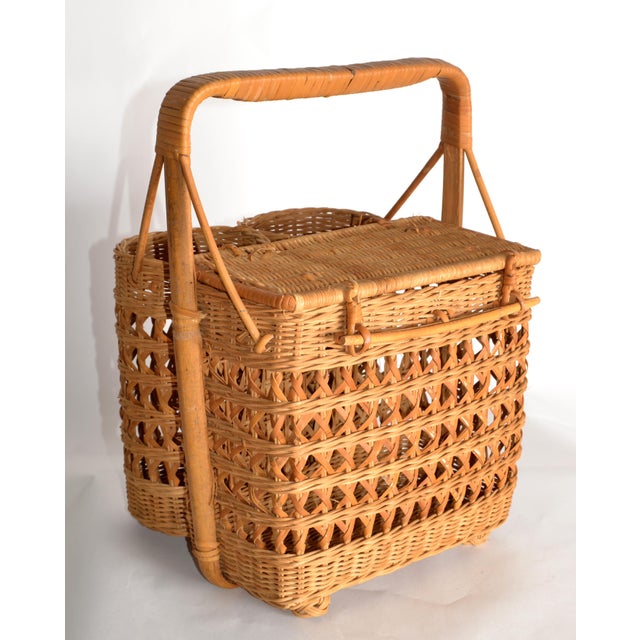 Whimsical hand-woven vintage 1950s French Rivera Bamboo, Wicker and Cane double wine basket. Bring timeless charm to your...