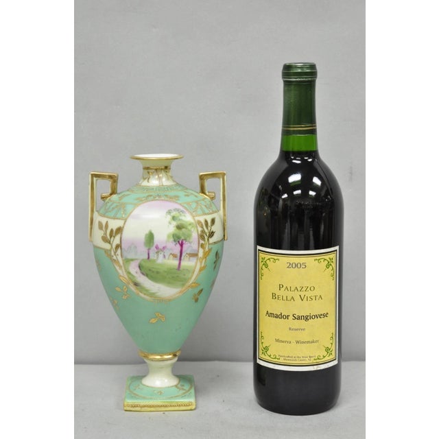 Antique Nippon Porcelain Hand Painted Windmill Scene Green Small Bolted Vase (B). Circa Early 20th Century. Measurements:...