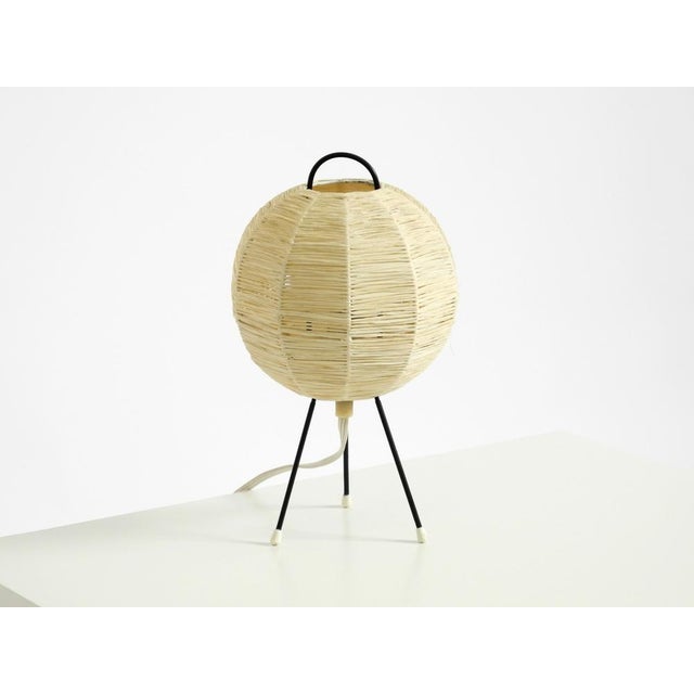 Beautiful mid-century modern tripod raffia table or night lamp. Typical 1950s design. Very good vintage condition with no...