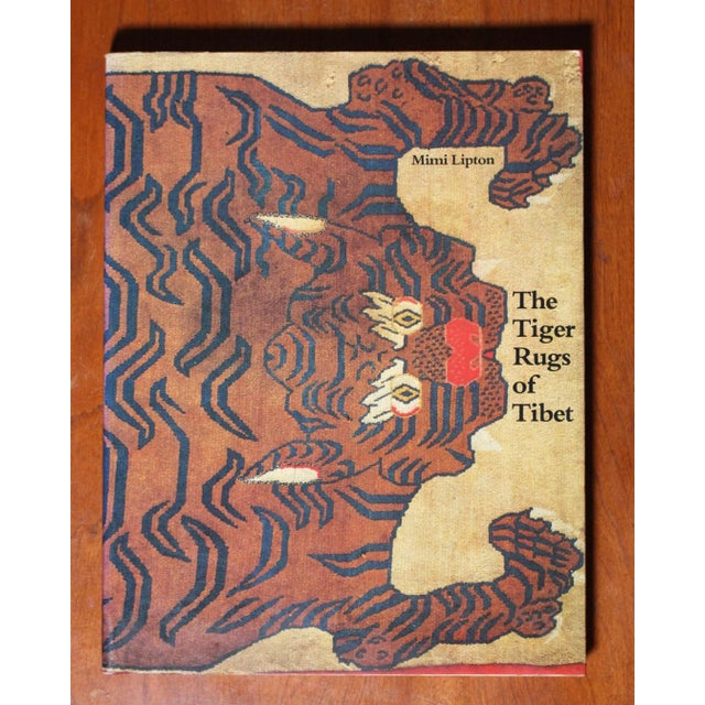 The Tiger Rugs of Tibet by Mimi Lipton and published by Thames & Hudson, 1st Edition, 1988. paperback. 191 pp. in...