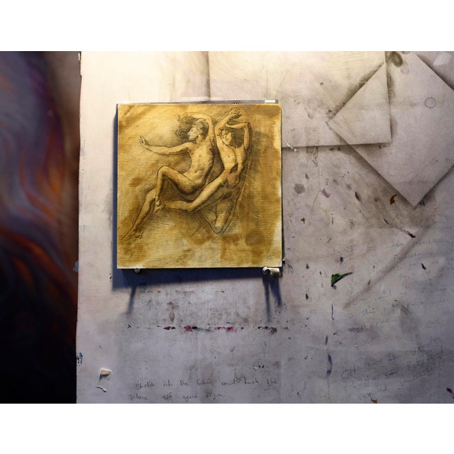 In "Intima II," two figures intertwine in a tender embrace, their soft forms emerging against a muted, atmospheric...