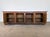 A sculptural and narrative-driven 20th-century enfilade/sideboard that beautifully bridges the gap between traditional...