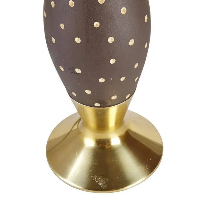 Sleek mid century modern table lamp with white porcelain glaze combined with a brown glaze with polka dots in the ceramic....