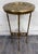 This is a beautiful vintage Hollywood Regency Chinoiserie style brass pedestal plant stand or accent table. It features...