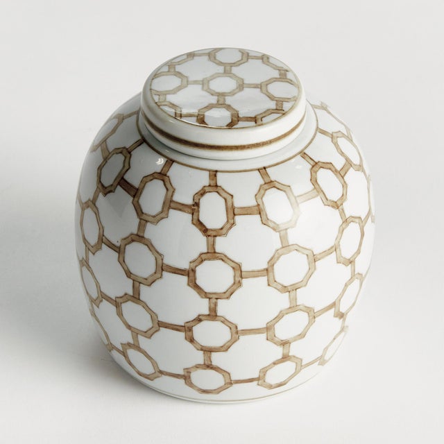 A classic chinoiserieinspired link pattern in taupe andWhite. In design, taupe is often associated with muted,...