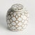 A classic chinoiserieinspired link pattern in taupe andWhite. In design, taupe is often associated with muted,...
